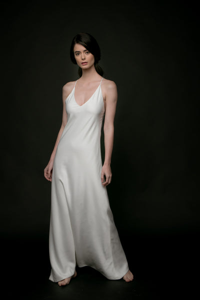 La Tercera ANYA silk slip dress with cross-back adjustable straps in cream front view